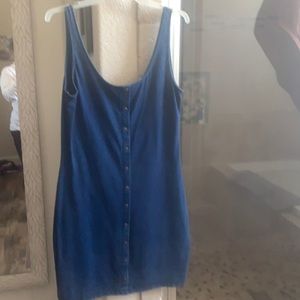 Very cute soft denim pull-on sleeveless dress. Low cut back.